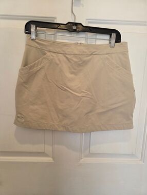 Khaki Under Armour Skort. Size 4